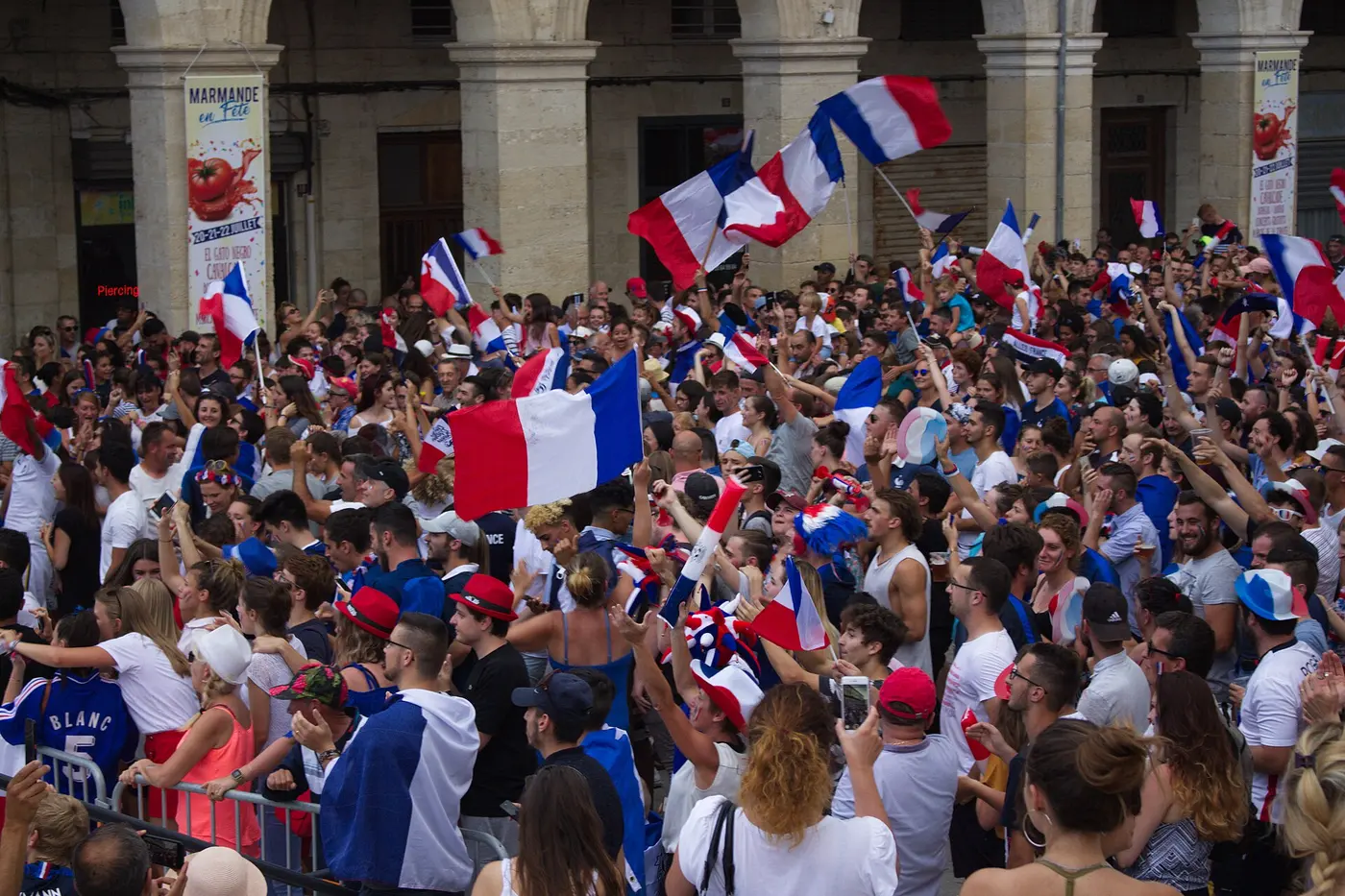 France supporters in blue and red wave tricolour flags in a packed stadium as France beat Morocco 2-0 in the World Cup 2026 quarter-final in Foxborough on July 9