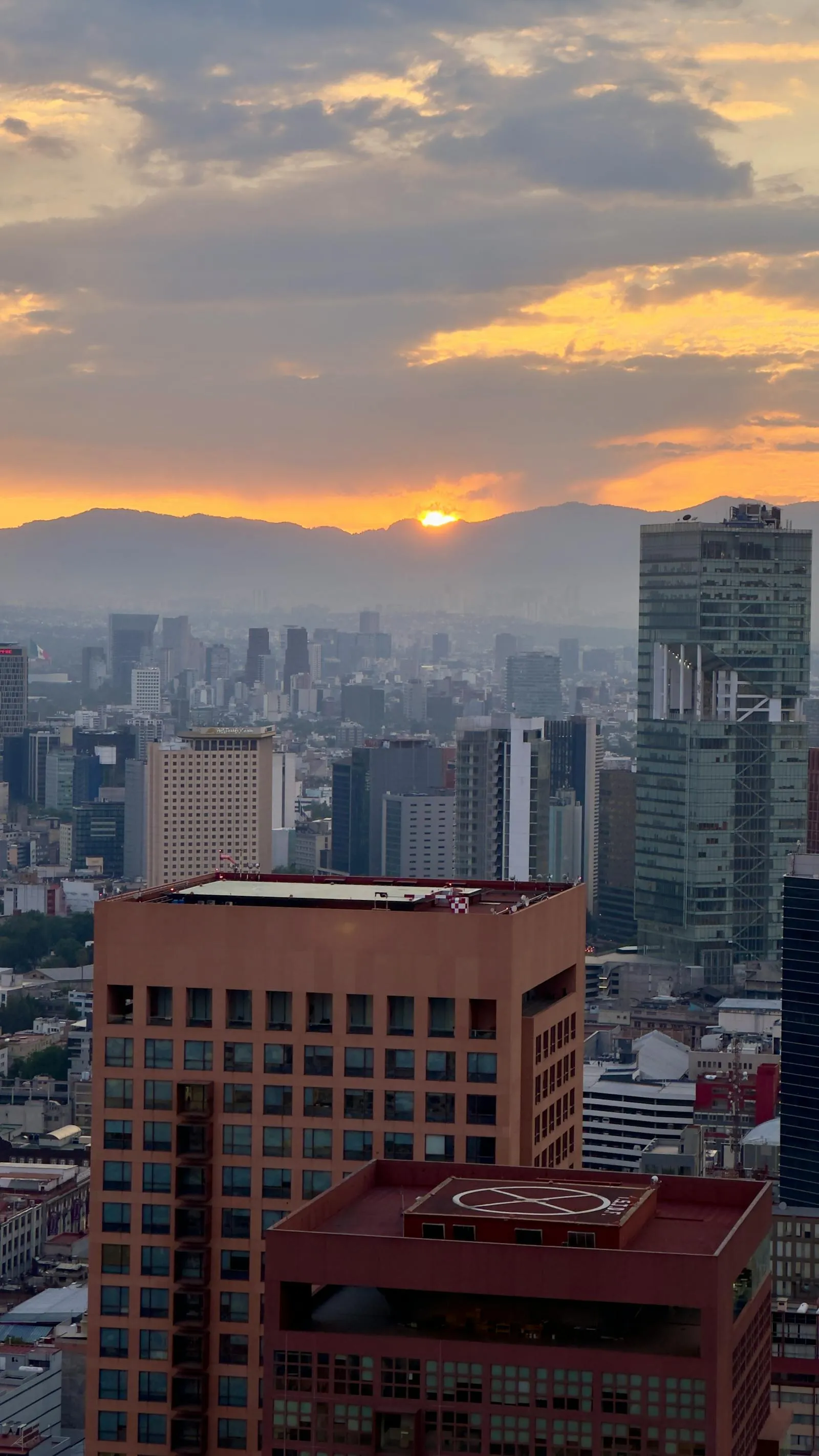 Mexico City skyline at sunset — Group A of the 2026 World Cup opens at Mexico City Stadium on June 11