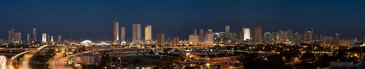 Miami downtown skyline at dusk over Biscayne Bay — the city's World Cup 2026 watch scene runs from downtown sports bars to South Beach and yacht parties