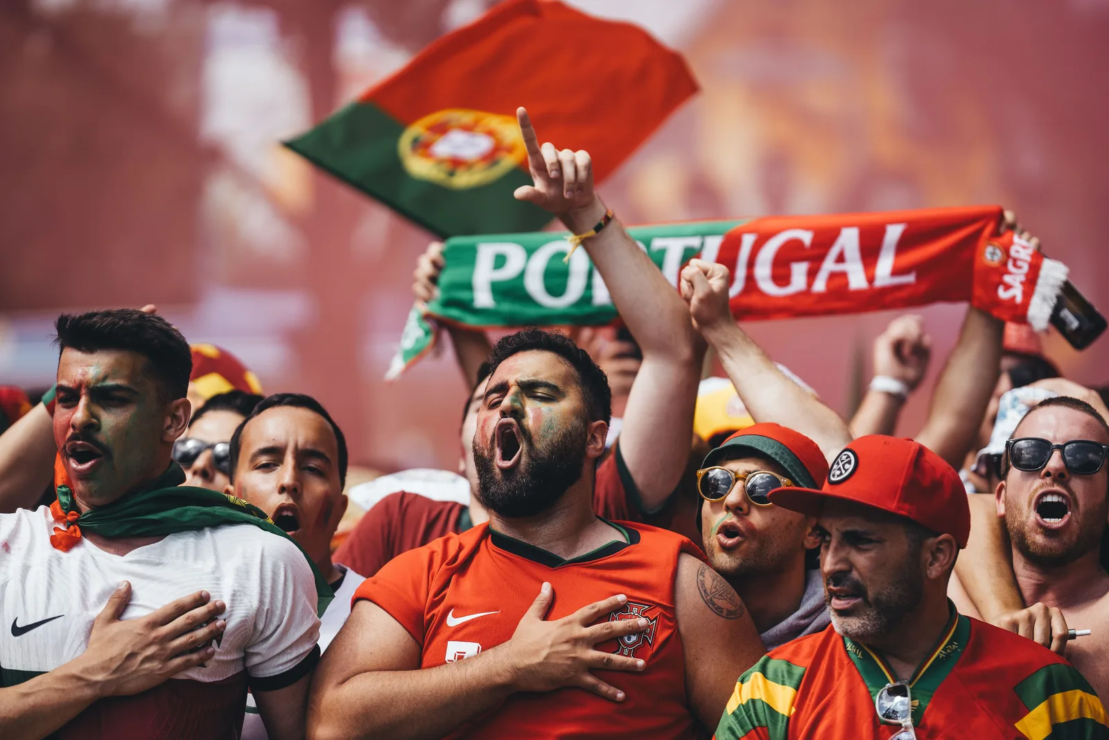 Portugal supporters celebrating with flags and scarves as their side beat Uzbekistan 3-1 in World Cup 2026 Group K on June 23, with Cristiano Ronaldo scoring twice