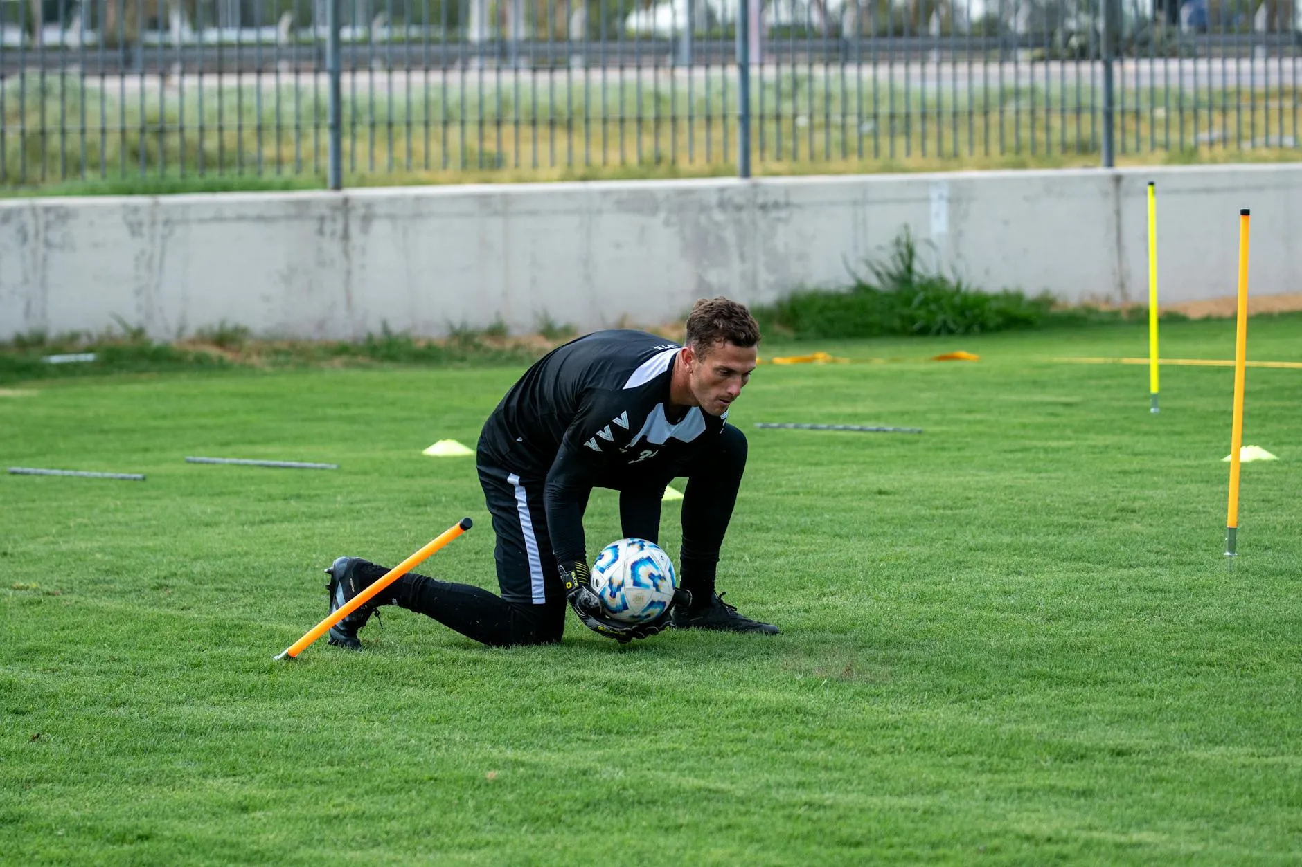 A player striking a ball during a training drill — the FIFA World Cup Golden Boot has gone to the tournament's top scorer at every edition since 1930, with Kylian Mbappé now the first man to win it back-to-back in 2022 and 2026
