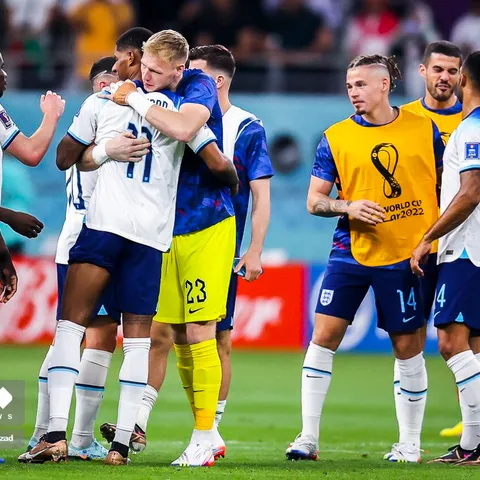 Bukayo Saka in the England shirt — the Arsenal winger is in Thomas Tuchel's 26-man England squad for World Cup 2026, wearing Nike's white home jersey with the single gold star above the crest marking the 1966 World Cup win, released globally on March 23, 2026 with the Group L opener against Croatia at AT&T Stadium in Arlington on June 17