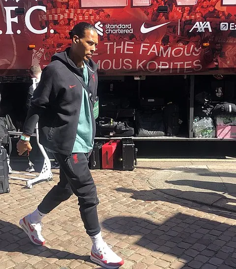 Virgil van Dijk in the Netherlands shirt — the Liverpool centre-back captains Ronald Koeman's 26-man Oranje squad for the 2026 World Cup, confirmed by the KNVB on Wednesday May 27 in Zeist, with the Group F opener against Japan at Dallas Stadium in Arlington on Sunday June 14